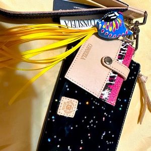 Consuela with tags wallet trio